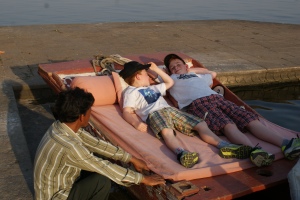 Danielo and Eitan getting comfortable for their boat ride. 